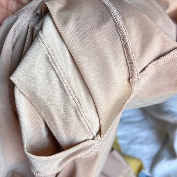 SPANX suit your fancy body suit.